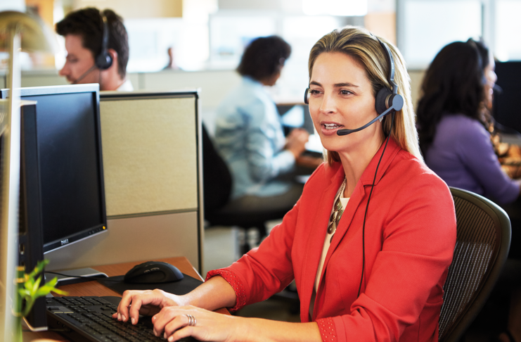 Lady wearing a Jabra Biz 2400 Wired Office Headset